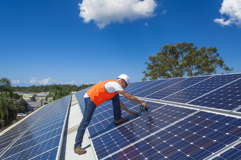 Technician Installing Solar Panels - Solar Power Systems in Whitsundays QLD