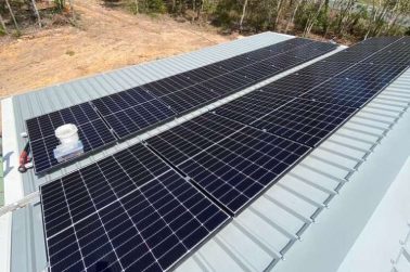 Solar Panels on a home with a tin roof — Solar Power Systems in Whitsundays QLD
