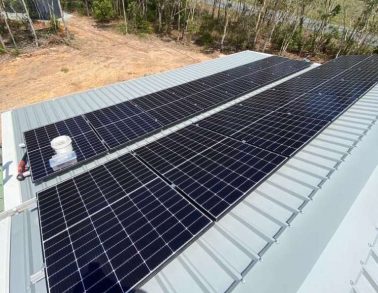 Solar Panels on a home with a tin roof — Solar Power Systems in Whitsundays QLD